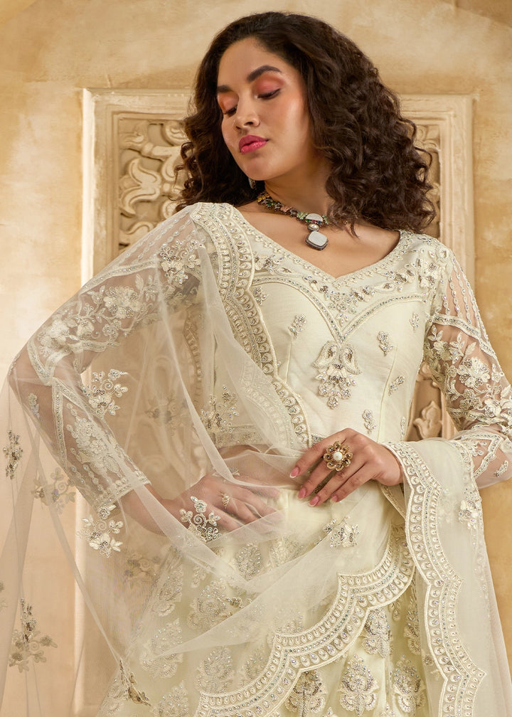Off White Net Lehenga Choli with Handcrafted Cording, Thread, and Stone Work