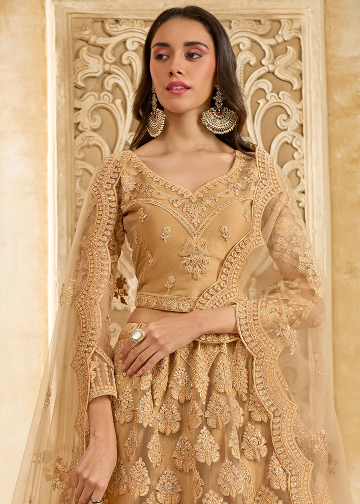 Tawny Brown Net Lehenga Choli with Handcrafted Cording, Thread, and Stone Work