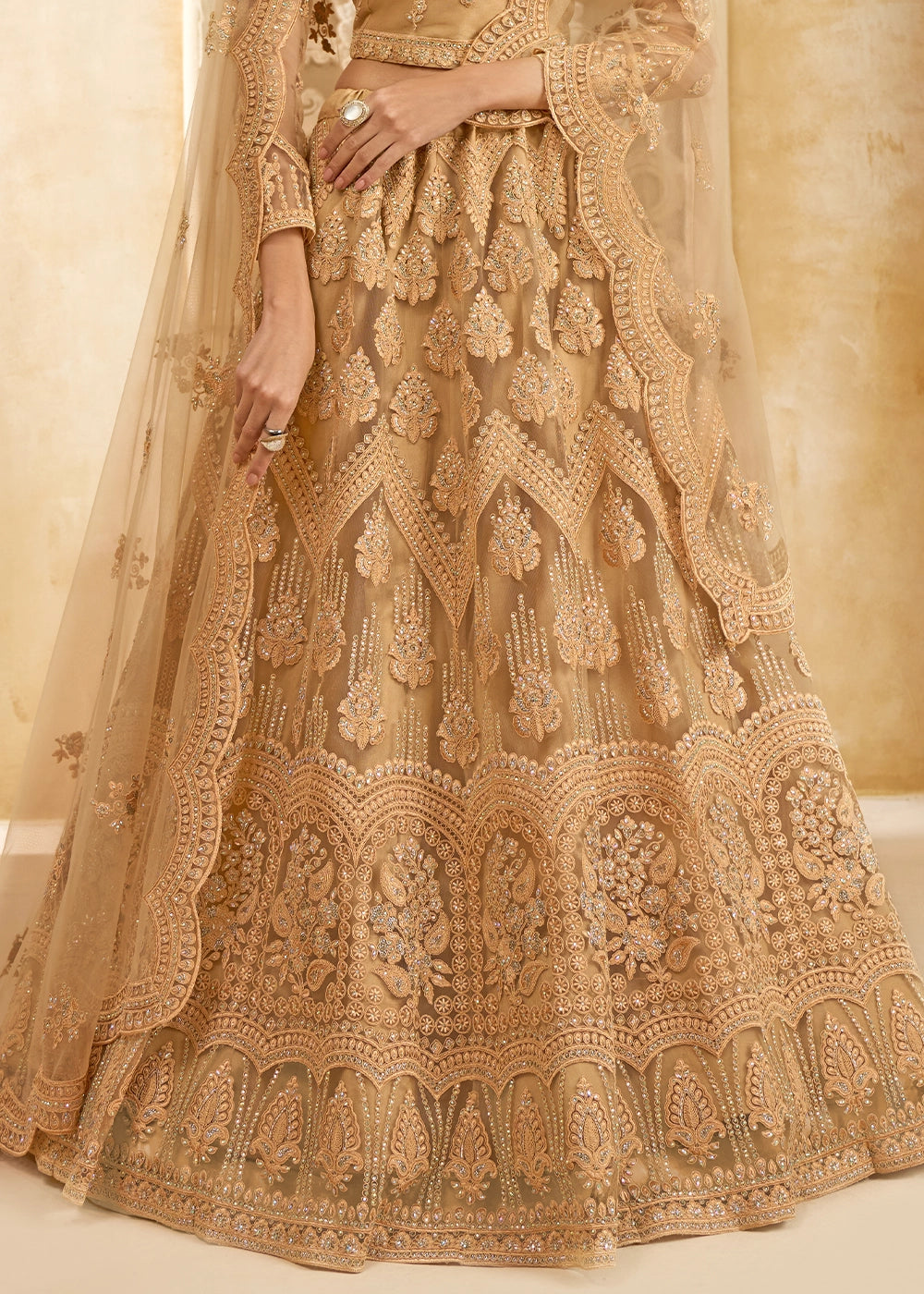 Tawny Brown Net Lehenga Choli with Handcrafted Cording, Thread, and Stone Work
