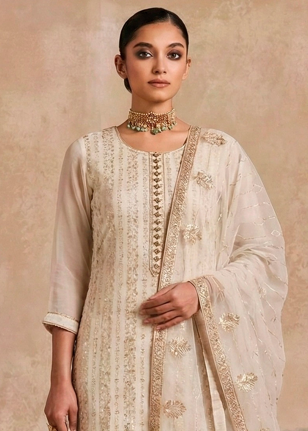 Parchment White Georgette Salwar Suit with Hand Embellishment