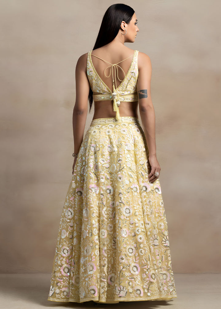 Butter Yellow Soft Net Lehenga Choli with Floral Sequin and Thread Embroidery