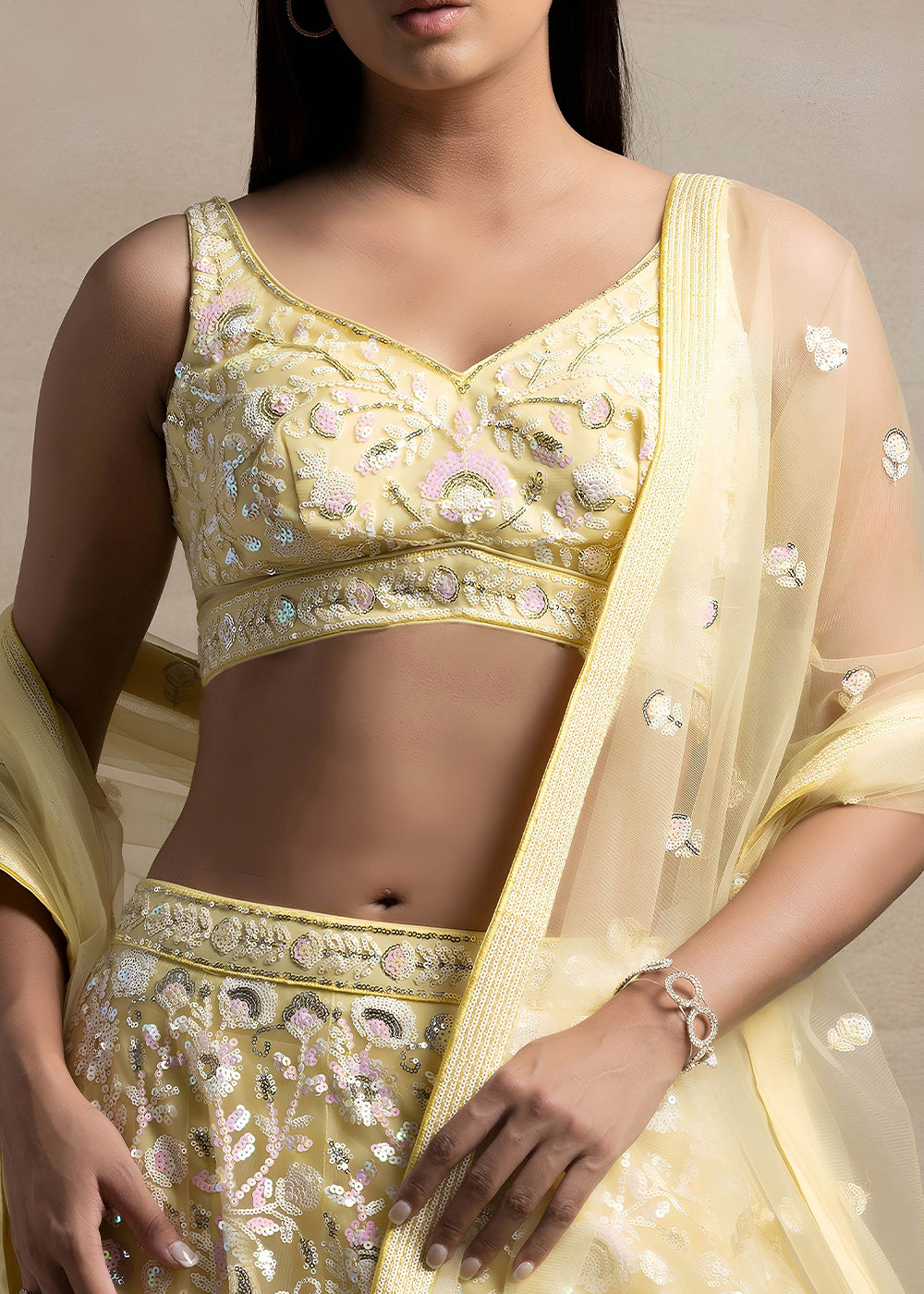 Butter Yellow Soft Net Lehenga Choli with Floral Sequin and Thread Embroidery