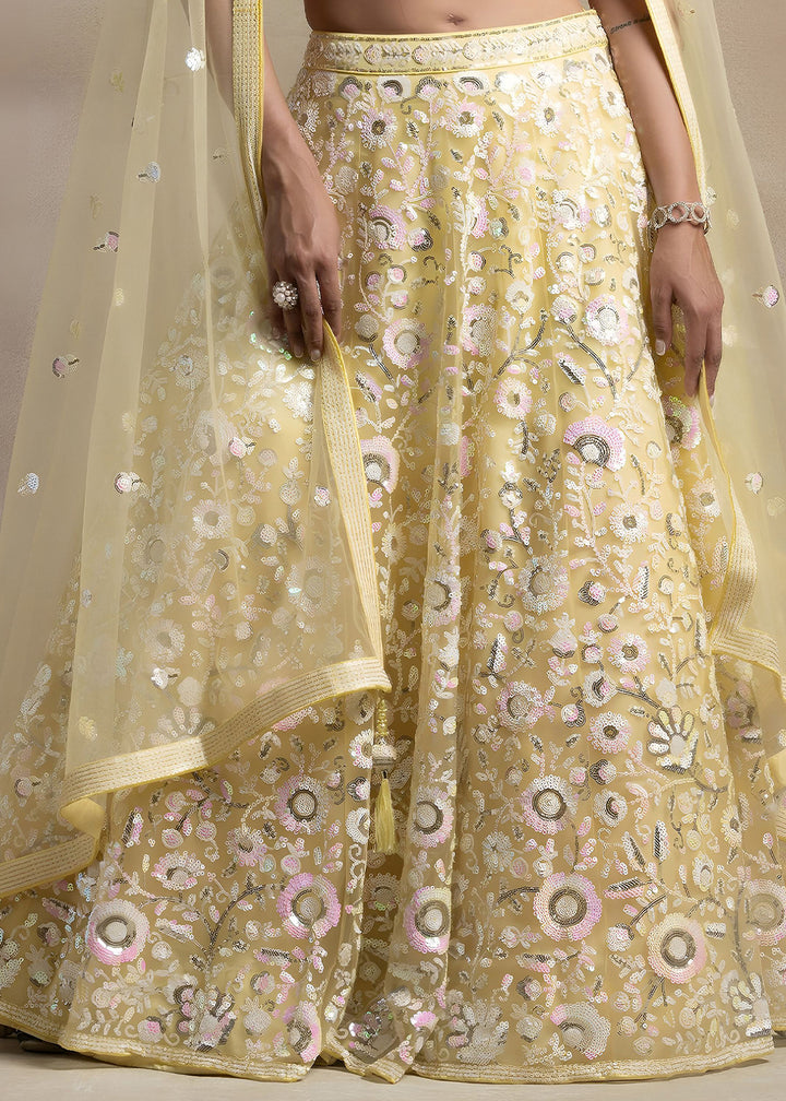 Butter Yellow Soft Net Lehenga Choli with Floral Sequin and Thread Embroidery