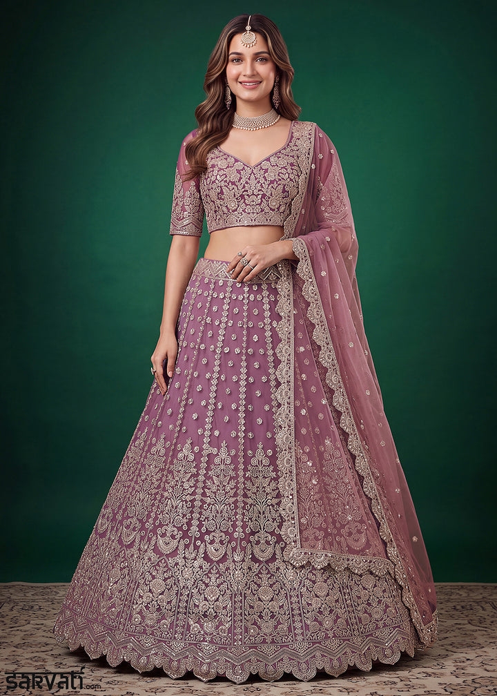 Mauve Purple Heavy Embroidered Soft Net Lehenga Choli with Zari, Sequin and Dori Work