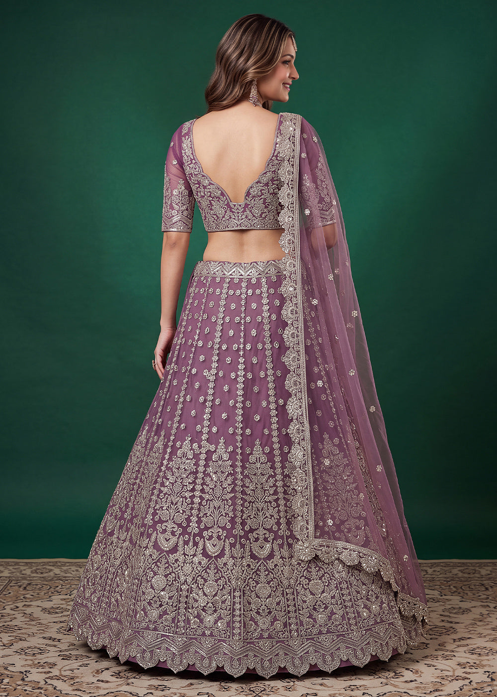 Mauve Purple Heavy Embroidered Soft Net Lehenga Choli with Zari, Sequin and Dori Work