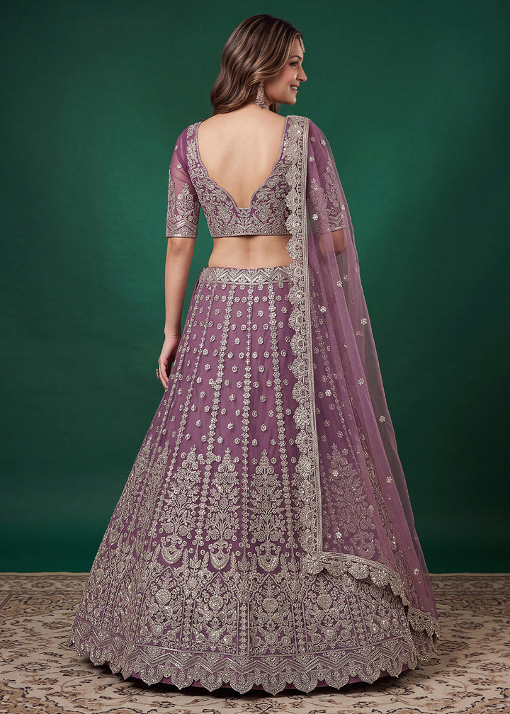 Mauve Purple Heavy Embroidered Soft Net Lehenga Choli with Zari, Sequin and Dori Work