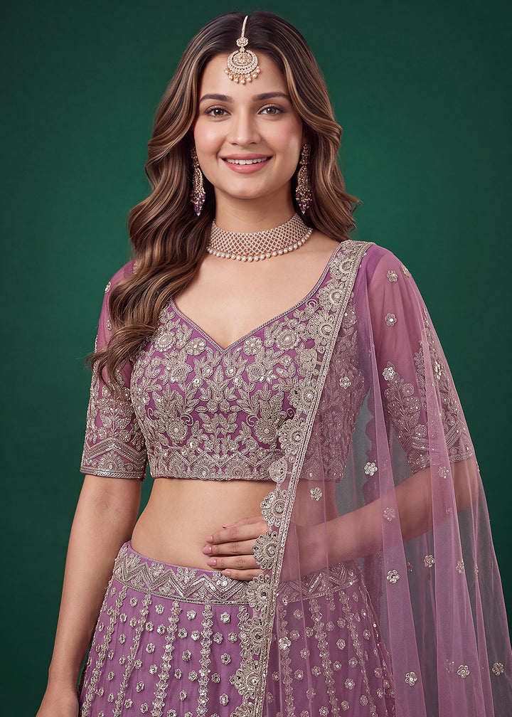 Mauve Purple Heavy Embroidered Soft Net Lehenga Choli with Zari, Sequin and Dori Work