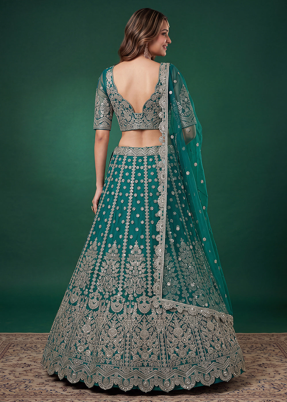 Teal Green Heavy Embroidered Soft Net Lehenga Choli with Zari, Sequin and Dori Work