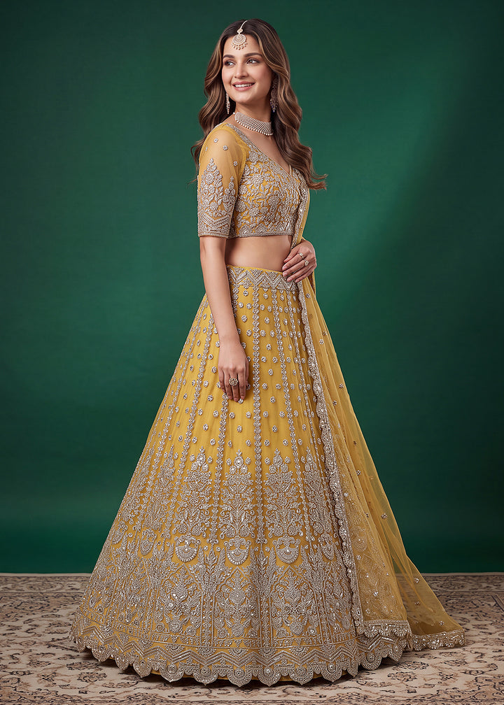 Mustard Gold Heavy Embroidered Soft Net Lehenga Choli with Zari, Sequin and Dori Work