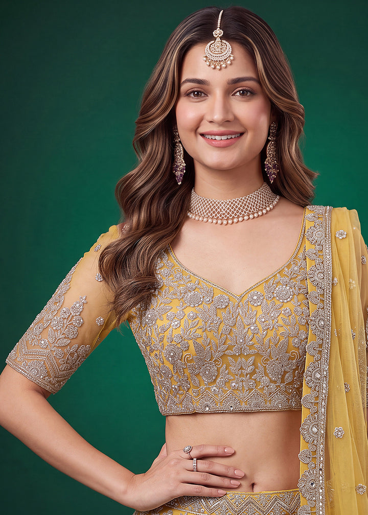 Mustard Gold Heavy Embroidered Soft Net Lehenga Choli with Zari, Sequin and Dori Work