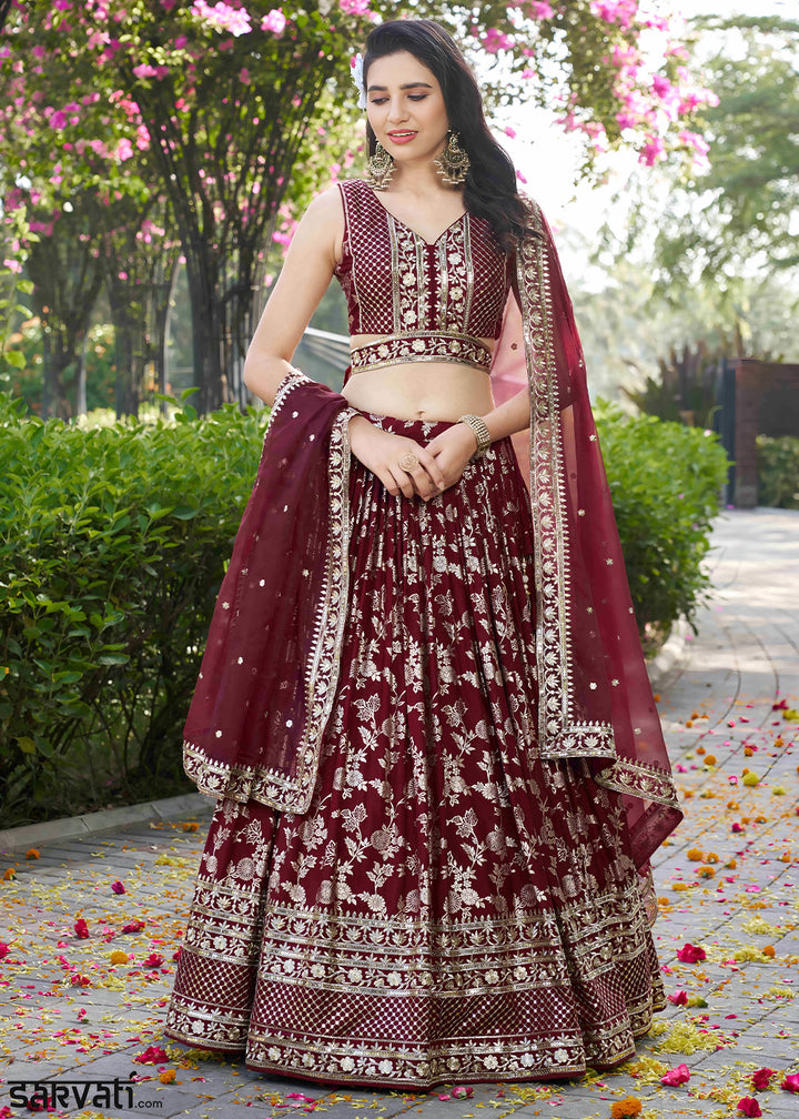 Maroon Red Jacquard Dola Silk Lehenga Choli with Floral Zari, Sequin &amp; Ornate Border Detailing