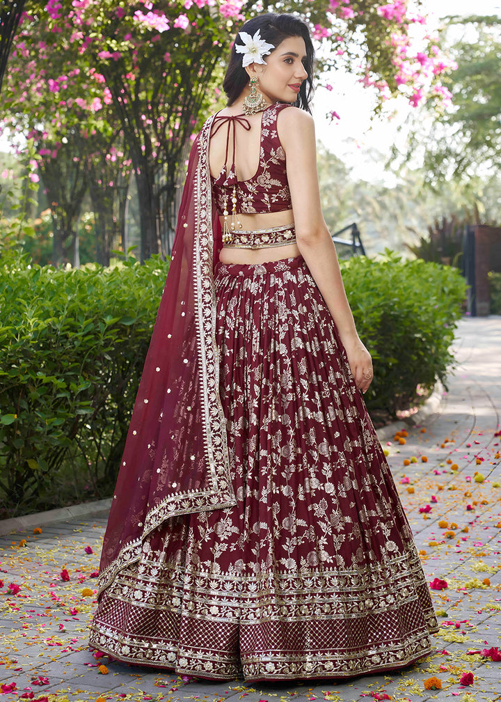 Maroon Red Jacquard Dola Silk Lehenga Choli with Floral Zari, Sequin &amp; Ornate Border Detailing