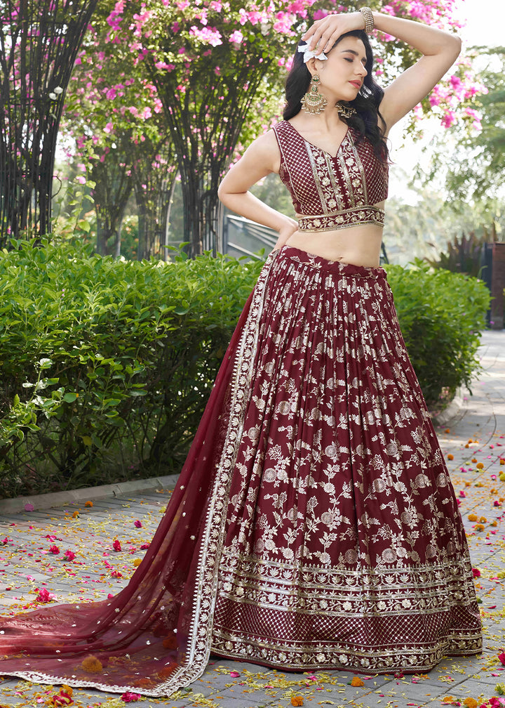 Maroon Red Jacquard Dola Silk Lehenga Choli with Floral Zari, Sequin &amp; Ornate Border Detailing