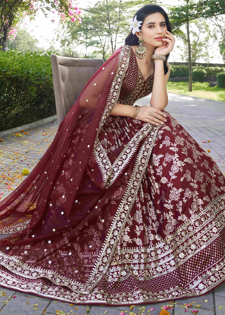 Maroon Red Jacquard Dola Silk Lehenga Choli with Floral Zari, Sequin &amp; Ornate Border Detailing