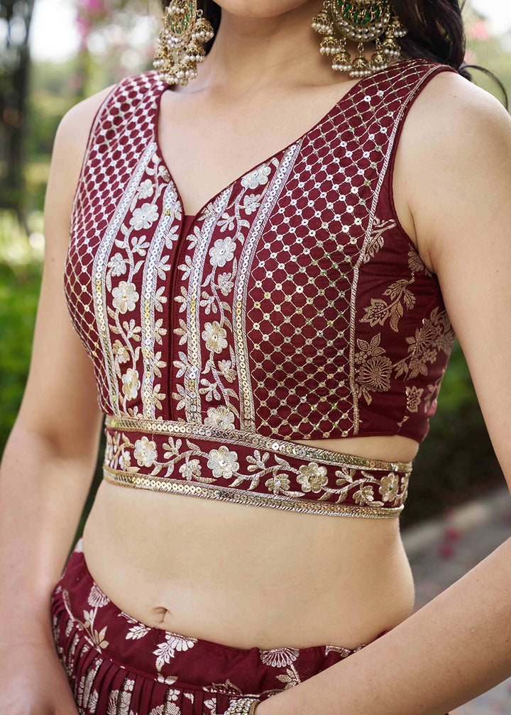 Maroon Red Jacquard Dola Silk Lehenga Choli with Floral Zari, Sequin &amp; Ornate Border Detailing