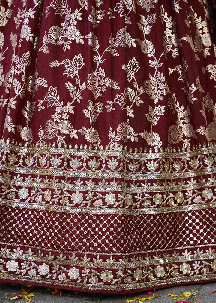 Maroon Red Jacquard Dola Silk Lehenga Choli with Floral Zari, Sequin &amp; Ornate Border Detailing