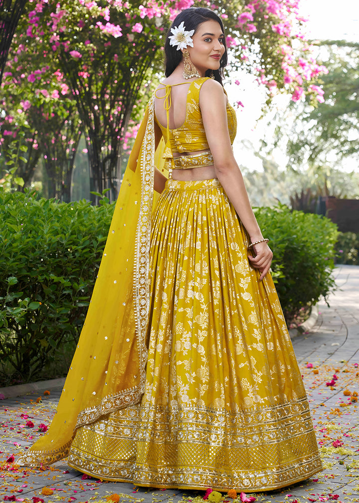 Mustard Yellow Jacquard Dola Silk Lehenga Choli with Floral Zari, Sequin &amp; Ornate Border Detailing