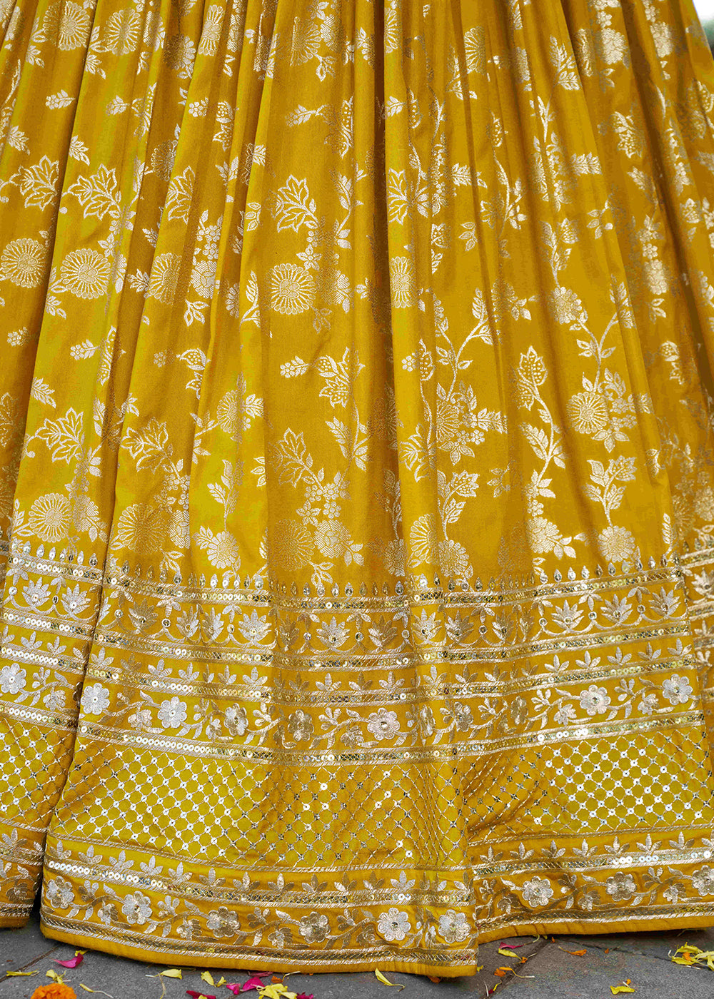 Mustard Yellow Jacquard Dola Silk Lehenga Choli with Floral Zari, Sequin &amp; Ornate Border Detailing