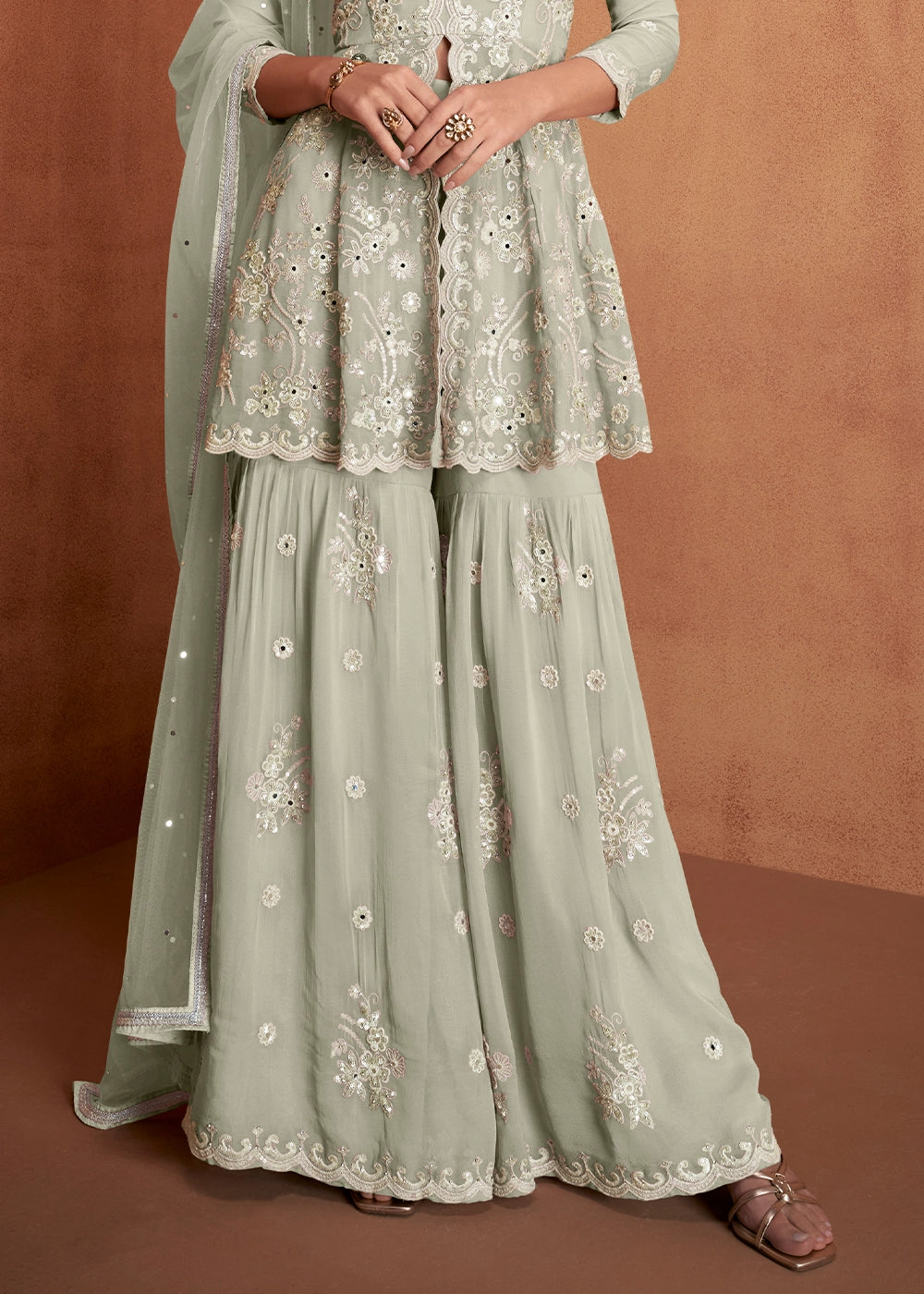 Tea Green Georgette Gharara Suit with Intricate White Thread Work