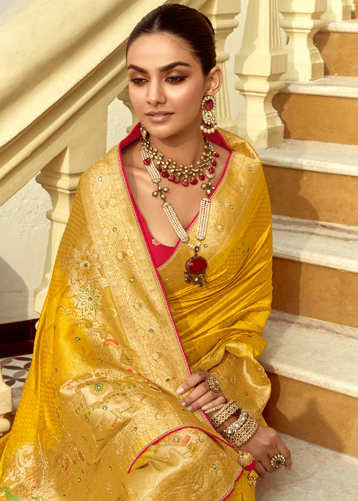 Canary Yellow Dola Silk Saree Featuring Zari Weave And Intricate Handwork With Cut Dana