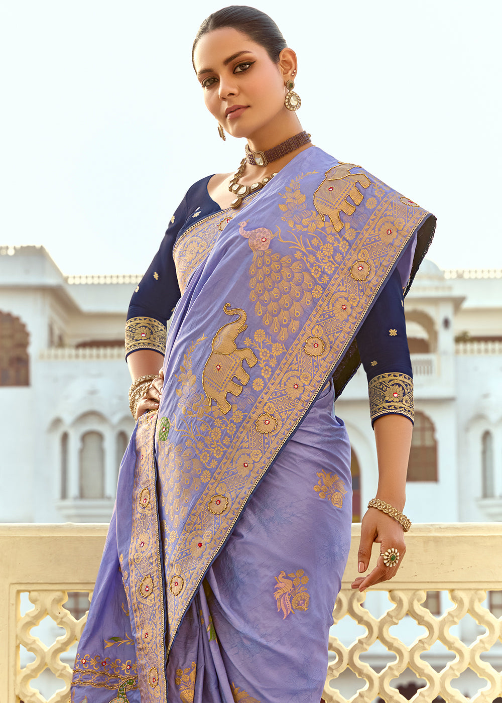 Soft Purple Dola Silk Saree Featuring Zari Weave And Intricate Handwork With Cut Dana