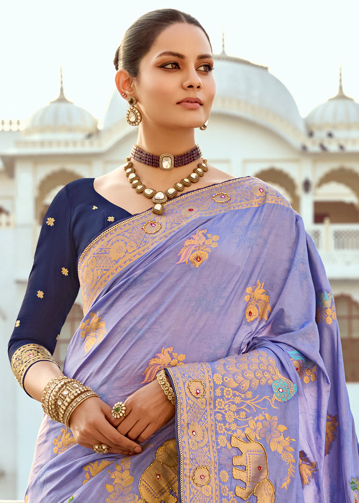 Soft Purple Dola Silk Saree Featuring Zari Weave And Intricate Handwork With Cut Dana