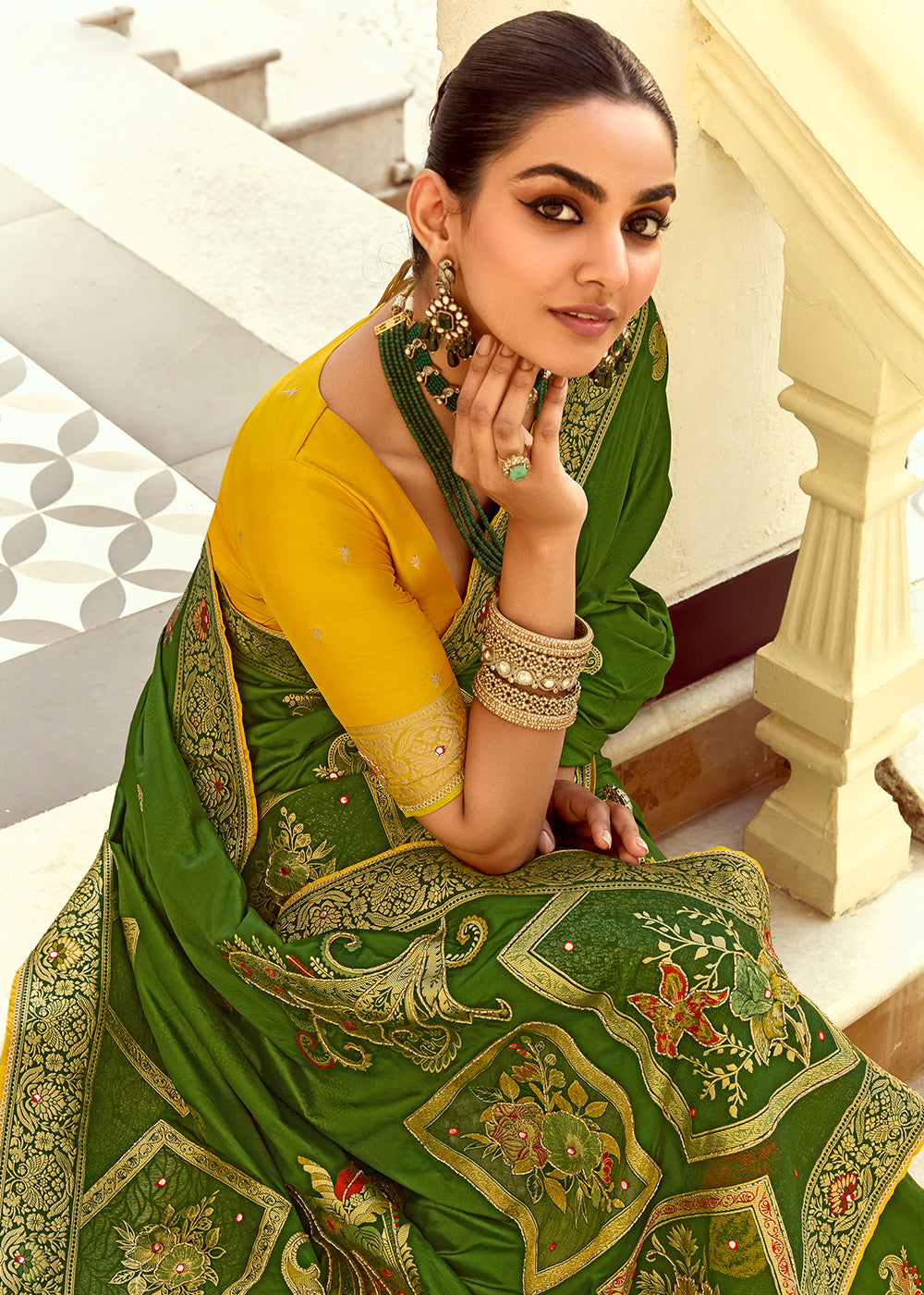 Forest Green Dola Silk Saree Featuring Zari Weave And Intricate Handwork With Cut Dana