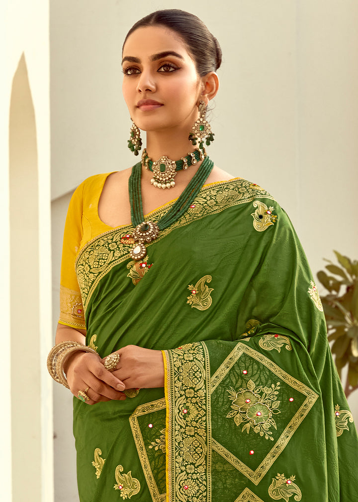 Forest Green Dola Silk Saree Featuring Zari Weave And Intricate Handwork With Cut Dana