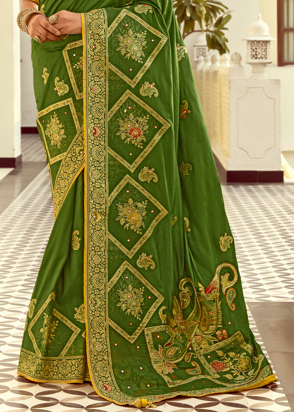 Forest Green Dola Silk Saree Featuring Zari Weave And Intricate Handwork With Cut Dana