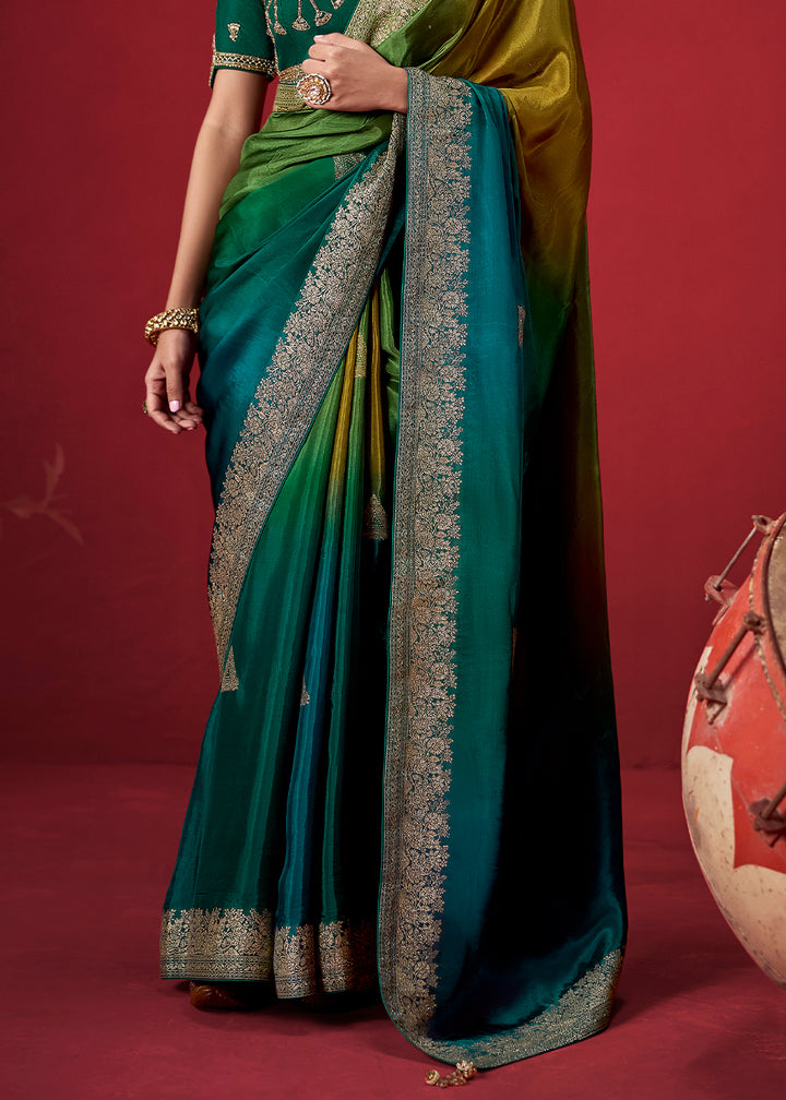 Olive Green & Peacock Blue Ombre Dola Crepe Silk Saree with Intricate Zari Border