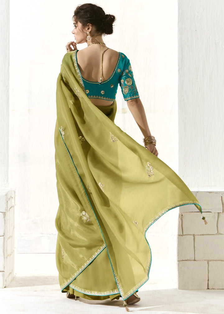 Olive Green Designer Tissue Organza Saree With All-Over Buttas And Hand Embroidered Blouse