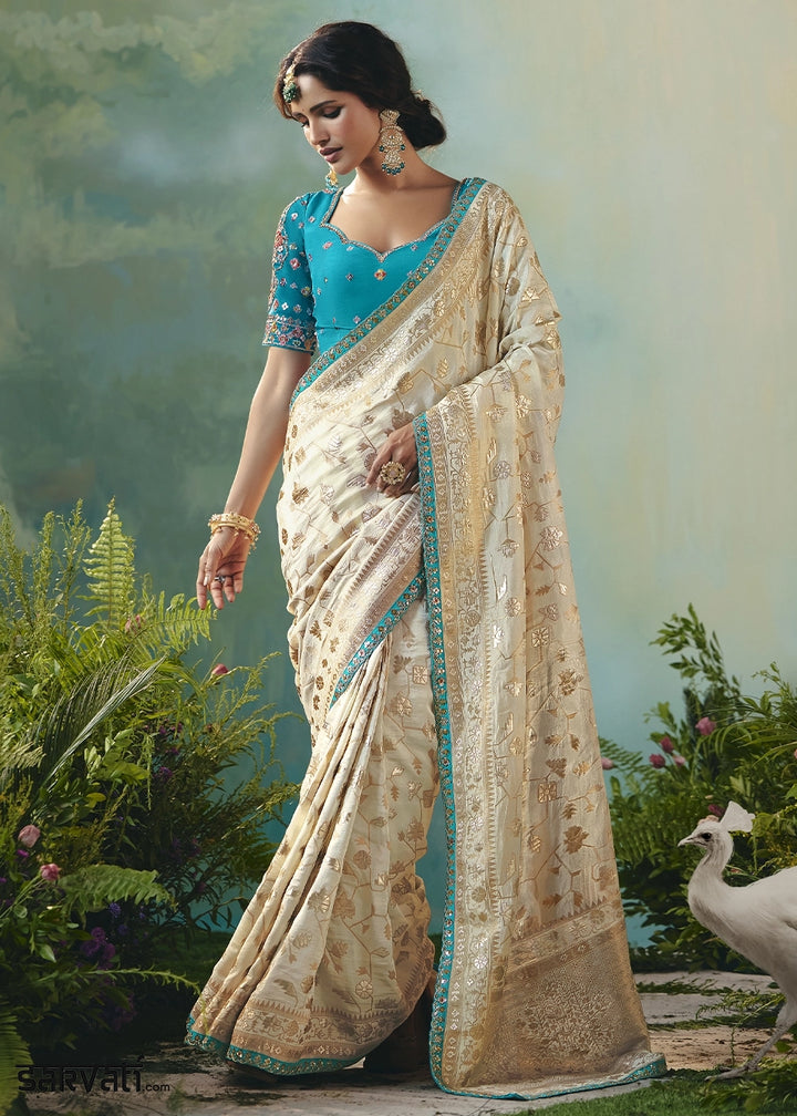 Cream White Viscose Dola Silk Saree with Handcrafted Zari & Sequin Work