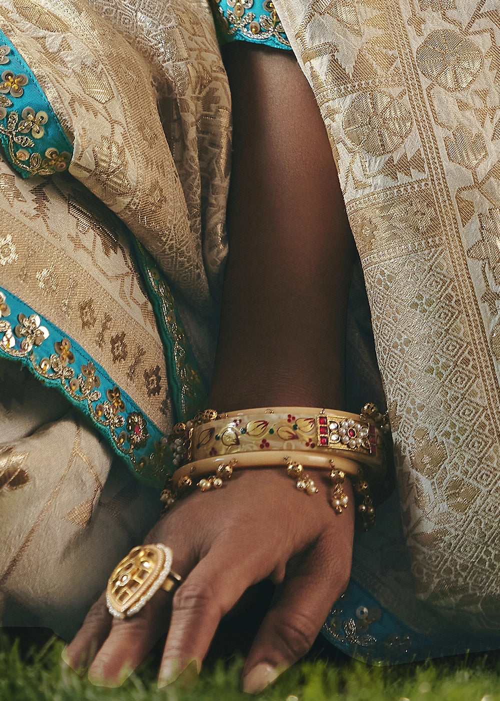 Cream White Viscose Dola Silk Saree with Handcrafted Zari & Sequin Work