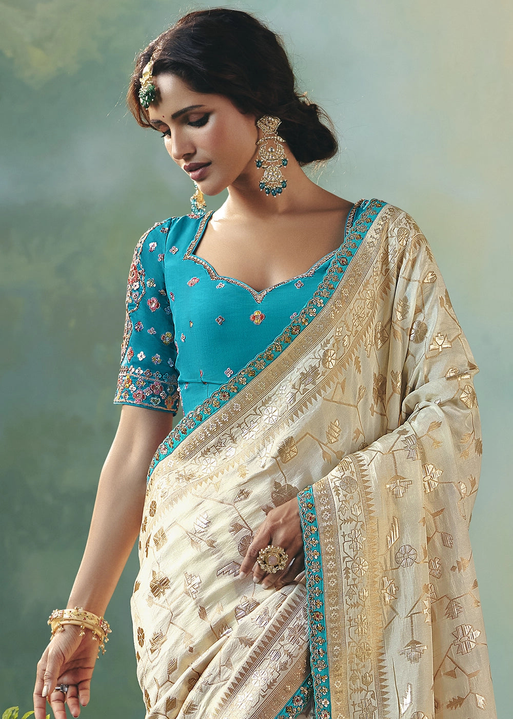 Cream White Viscose Dola Silk Saree with Handcrafted Zari & Sequin Work