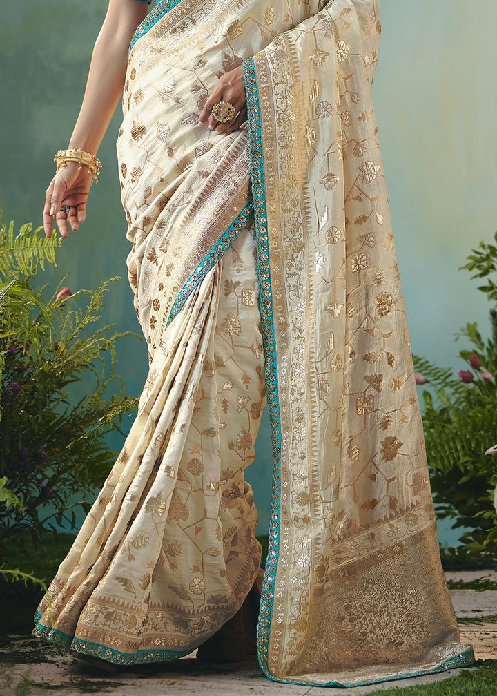 Cream White Viscose Dola Silk Saree with Handcrafted Zari & Sequin Work