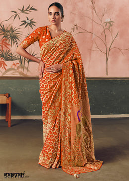Pumpkin Orange Khaddi Georgette Saree with Bandhej Weaving Artistry