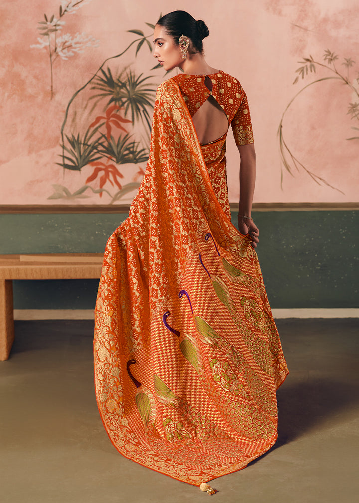 Pumpkin Orange Khaddi Georgette Saree with Bandhej Weaving Artistry