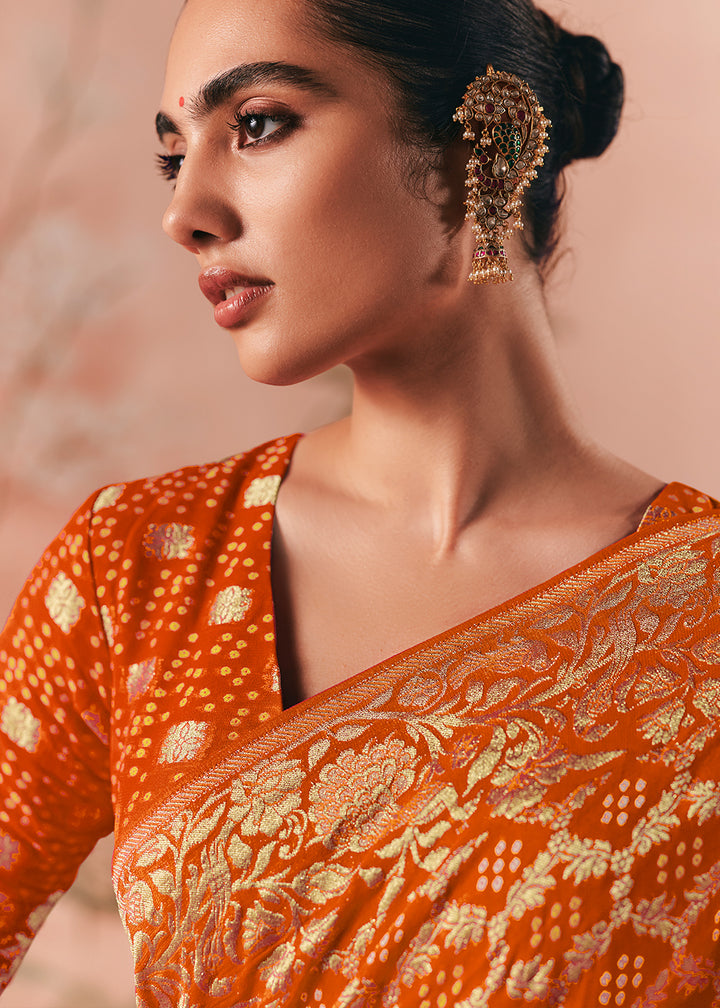 Pumpkin Orange Khaddi Georgette Saree with Bandhej Weaving Artistry