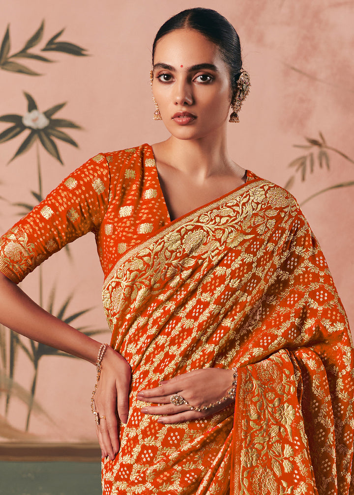 Pumpkin Orange Khaddi Georgette Saree with Bandhej Weaving Artistry