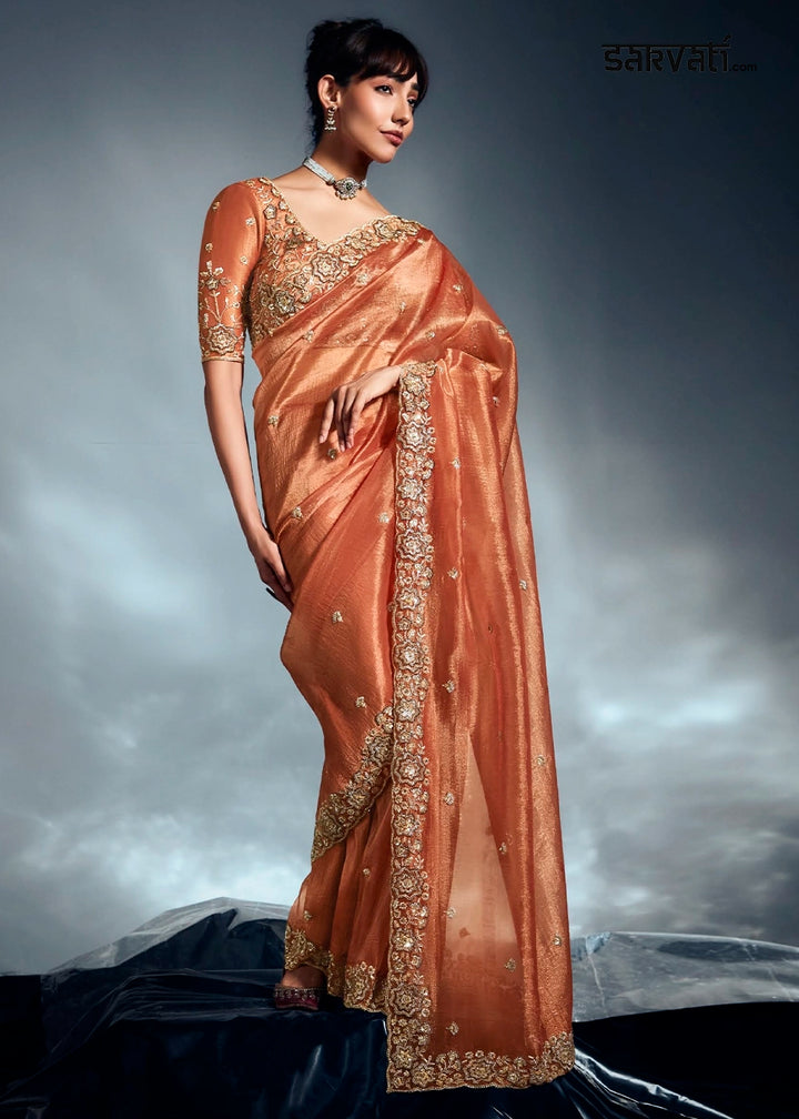 Sassy Salmon Orange Designer Saree in Tissue Fabric with Hand Embroidery