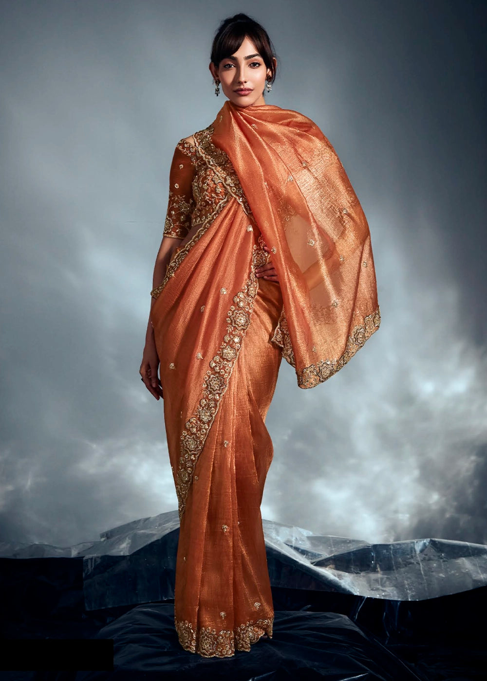 Sassy Salmon Orange Designer Saree in Tissue Fabric with Hand Embroidery
