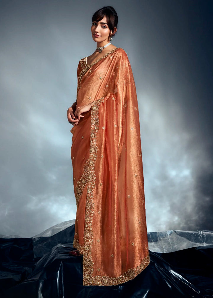 Sassy Salmon Orange Designer Saree in Tissue Fabric with Hand Embroidery