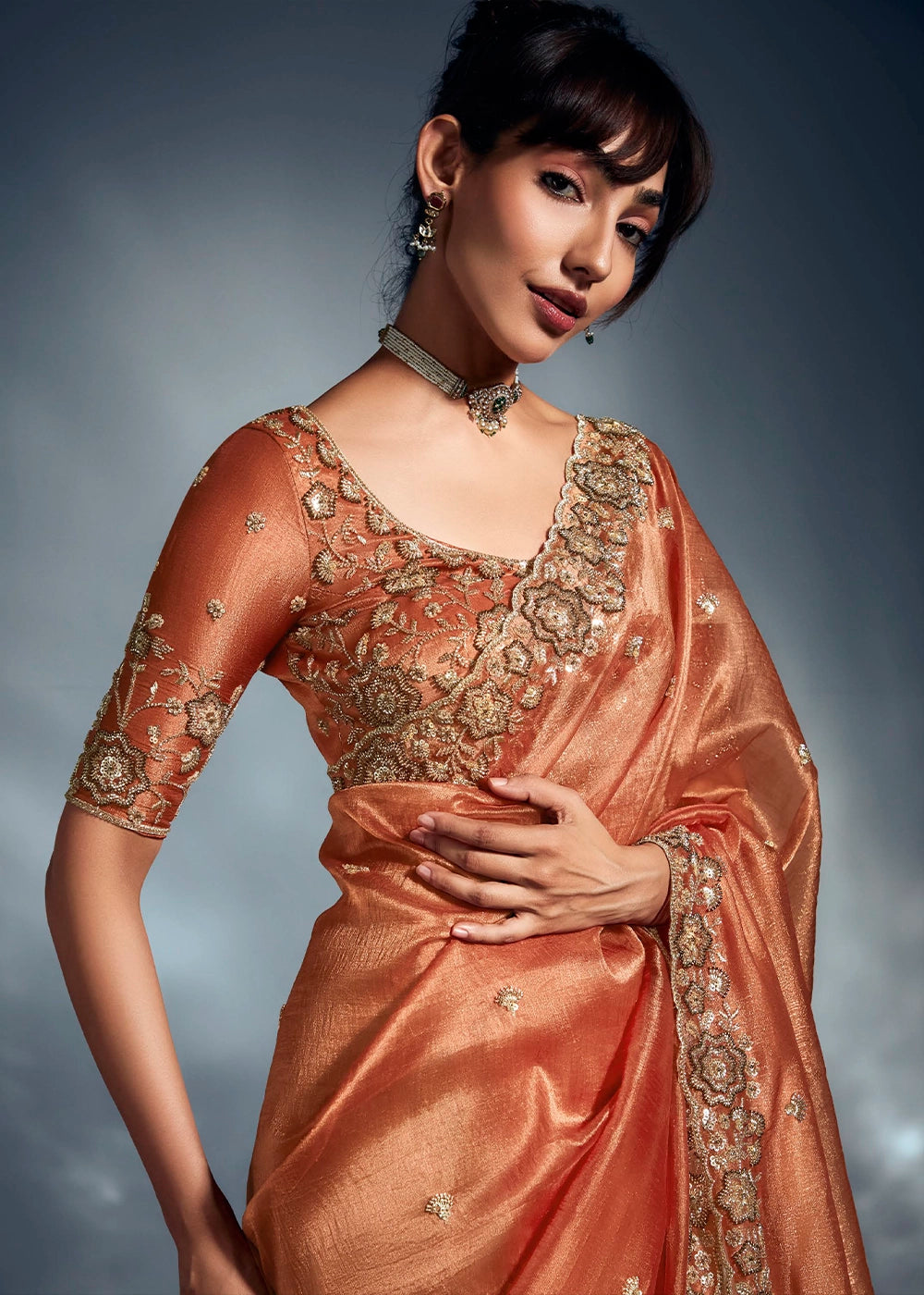 Sassy Salmon Orange Designer Saree in Tissue Fabric with Hand Embroidery