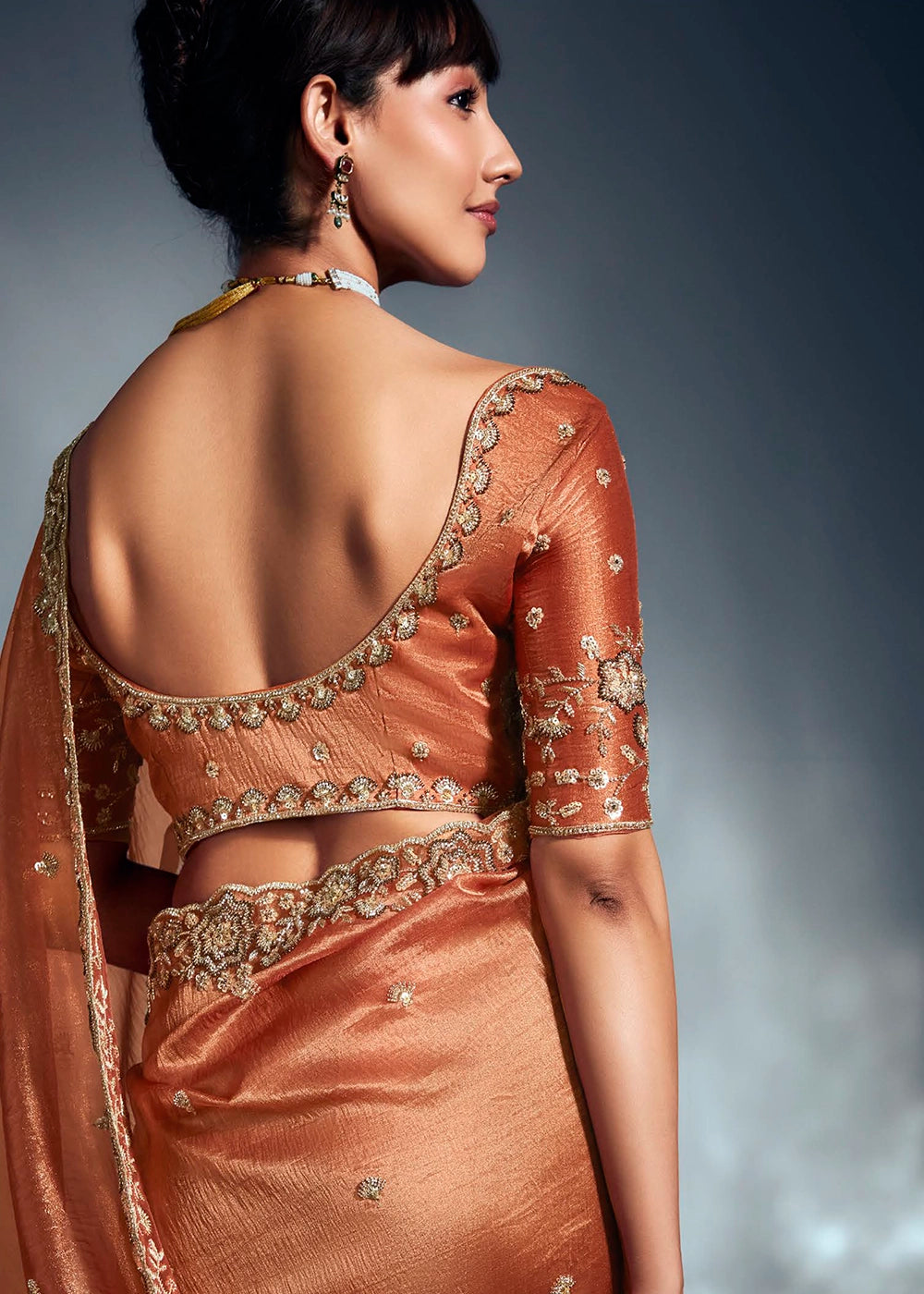 Sassy Salmon Orange Designer Saree in Tissue Fabric with Hand Embroidery