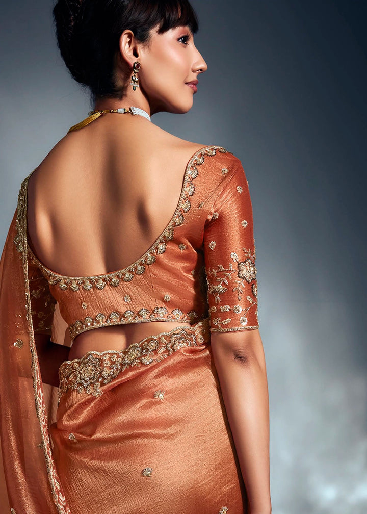 Sassy Salmon Orange Designer Saree in Tissue Fabric with Hand Embroidery