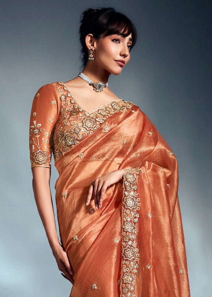 Sassy Salmon Orange Designer Saree in Tissue Fabric with Hand Embroidery