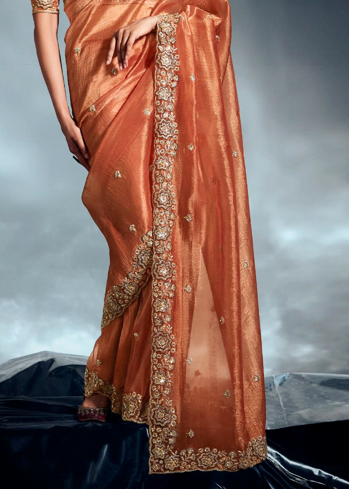 Sassy Salmon Orange Designer Saree in Tissue Fabric with Hand Embroidery