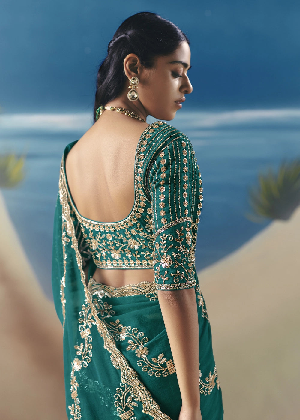 Teal Green Satin Organza Saree with Elegant Sequin & Stone Detailing