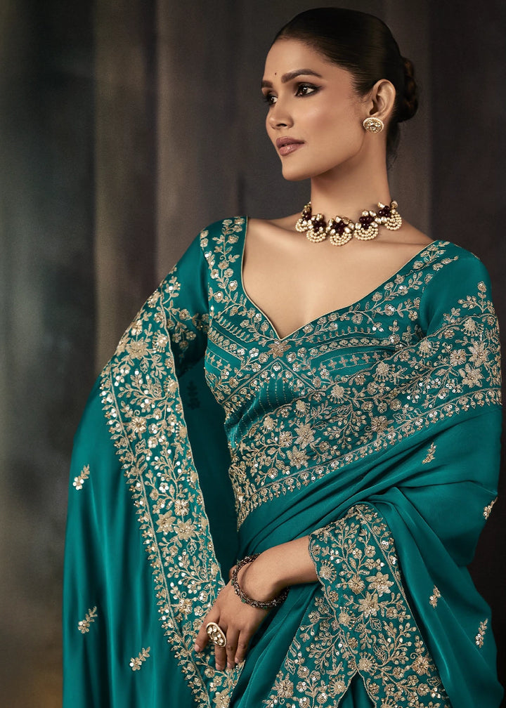 Cyan Blue Embroidered Satin Crepe Saree with Aari Detailing