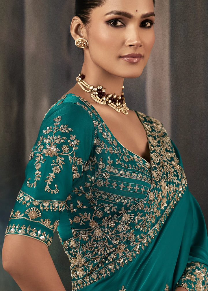 Cyan Blue Embroidered Satin Crepe Saree with Aari Detailing